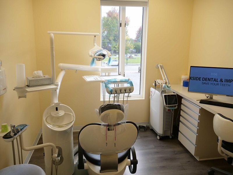 Inside of treatment room with chair and dental tools