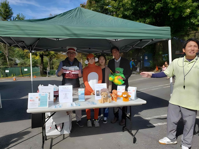 Outside with staff dressed up for event